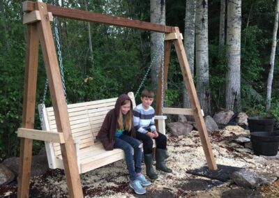 Kids seating on swing